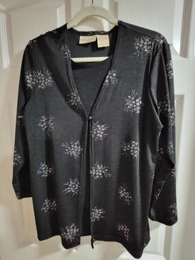 Soft black cardigan with white floral pattern. Christie & Jill brand, petite Med